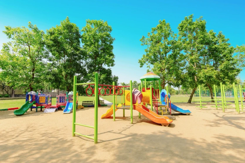 Trident Parktown Panipat kids play area with slides and outdoor play equipment